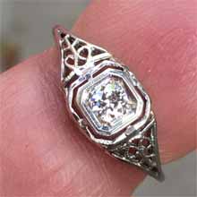 14 karat filigree white gold and diamond ring, circa 1930's centering a third of a carat old european cut diamond. Made in America, $1,200.  Nobel Antique Jewelry Store, Santa Monica, Ca.
