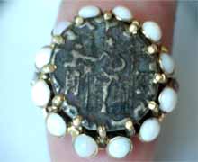 Antique ring surrounded by opals, circa 1930s. Nobel Antique Jewelry Santa Monica.