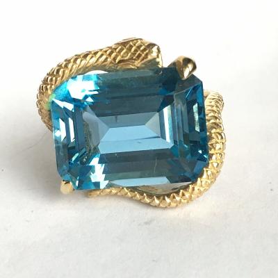 yellow gold blue topaz ring with snake