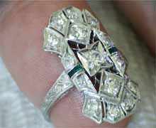 Antique platinum, diamond, and emerald ring. Circa 1920s. Made in America. Nobel Gems, Inc. Santa Monica