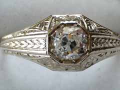 18 karat white gold and one carat diamond men's ring. circa 1930s. Nobel Antique Jewelry Store, Santa Monica, Ca.