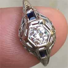 Antique white gold and diamond ring with french cut sapphires on sides. Circa 1930s. Made in America. Nobel Gems, Inc. Santa Monica